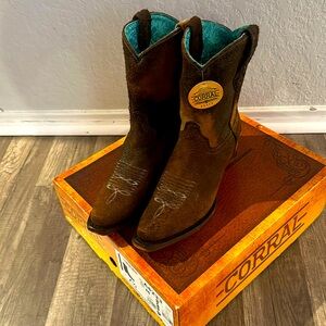 Brand new pair of Corral honey lamb ankle boots. Never been worn. Box included